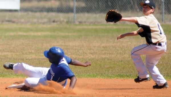 Georgiana School’s Jaylon Hall slides safely into second base during the Panthers’ 8-6 win over Greenville High School Saturday in Georgiana. (Advocate Staff/Andy Brown)