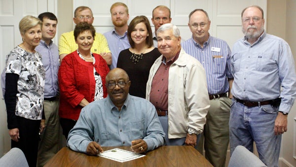 Greenville Mayor Pro tem Jeddo Bell signed a proclamation Thursday proclaiming April as Civitan Awareness Month in the City of Greenville. On hand for the signing were, front row from left to right, Susan Murphy, Linda Holley, Laura Gibbs and Gene Autrey. Back row from left to right, Justin Pierce, Lomax Owens, Marty Sexton, Allen Peterson, Mark Coleman and Bobby Phelps. (Advocate Staff/April Gregory)