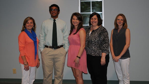 The Butler County Foster and Adoptive Parent Association presented Jake Dean and Tiffany Faulkner with scholarships during the organization’s second annual scholarship banquet on Thursday night at Walnut Street Church of Christ. Pictured are, from left to right, Jackie Thompson, Dean, Faulkner, Lindsey Croley and Rachel Turner. (Advocate Staff/Andy Brown)