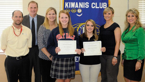 The Greenville Kiwanis Club presented Fort Dale Academy senior Anne Matthews and Greenville High School senior Kayla Small with the club’s Community Service Scholarship on Tuesday. Each students received a $1,000 scholarship. The student must have provided at least 100 hours of certified community service during Key Club membership years. The students service could be with the Key Club, Kiwanis Club, community organizations, school learning projects, religious-based service or an individual effort to help others and improve the community. Pictured are, from left to right, Josh Simmons, Warren Matthews, Elizabeth Matthews, Anne Matthews, Kayla Small, Brandi Autrey and Tera Simmons. (Advocate Staff/Tracy Salter)