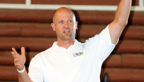 Heisman Trophy winner Danny Wuerffel speaks to a crowd of nearly 1,000 Friday night at the annual Back to School Bash in Georgiana. (Advocate Staff/Jonathan Bryant)