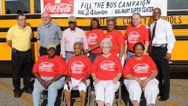 The Butler County Retired Teachers Association kicked off its annual “Fill the Bus” campaign Friday morning at Walmart. The retired educators are collecting school supplies for the students, teachers and nurses of the Greenville, Georgiana and McKenzie public schools. The campaign will run through Sunday. Pictured are, front row from left to right, Geraldine C. Feagin, secretary; Vonciel J. Bedgood; Betty A. Foster, treasurer; and Ruby Shambray, president. Back row, from left to right, Mike Gunter, McKenzie School principal; Lester Odom Jr., Mayor of McKenzie; Oliver Brooks; Edith Brooks; Doris L. Peagler; R. Wayne Boswell, vice president; and Darren Douthitt, Superintendent of Butler County Schools. (Advocate Staff/Andy Brown)