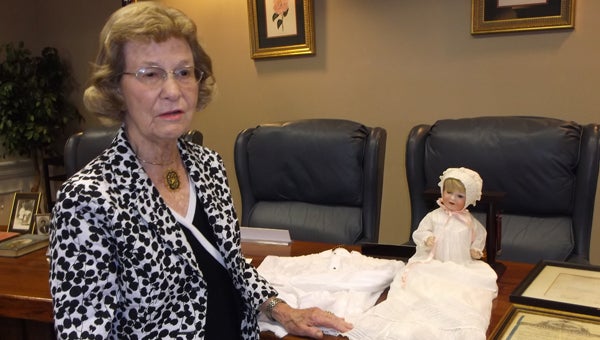 Caroline Ryan was one of several members who brought items to the last Butler County Historical Society meeting.  She is pictured with her antique doll, previously owned as a girl by her aunt, the late Caroline Crenshaw Rogers. (Submitted Photo) 