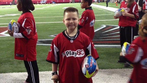 Eight-year-old Christian Hill is making his third trip to Atlanta in as many years for the national round of the NFL Punt, Pass & Kick competition. (Courtesy Photo)