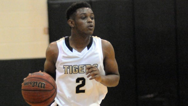 Greenville High School's Zac Smith scored 14 points in the Tigers' 57-48 loss to Sumter-Central High School Friday night. (Advocate Staff/Andy Brown)
