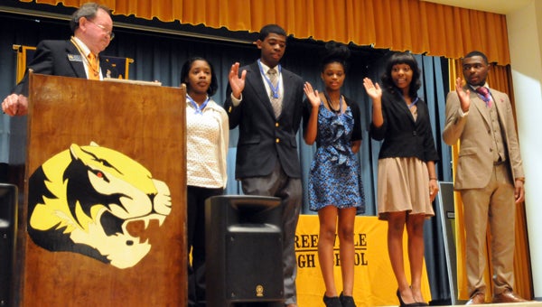 Civitan International Alabama-West Florida District Gov. Jack Groves swears in the officers for the newly formed Greenville High School Junior Civitan Club during a ceremony on Wednesday. Pictured, from left to right, are Daisha Durant , president; Joseph Longmire, vice president; Asia Crenshaw, secretary; Mia Taylor, treasurer; and Absalom Adams, chaplain. (Advocate Staff/Andy Brown)  