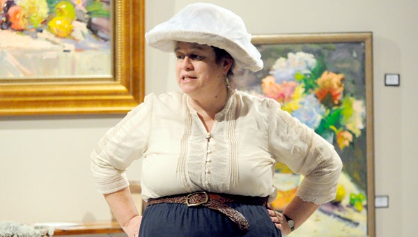 Julie Williams portrays Titanic survivor Sylvia Caldwell during a one-woman show at the High Horse Gallery Thursday evening. Williams is the author of “A Rare Titanic Family: The Caldwells Story of Survival.” (Advocate Staff/Jonathan Bryant)