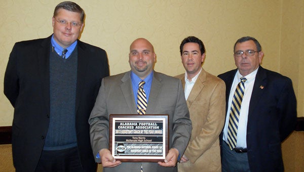 McKenzie School’s Tony Norris was recently named the Alabama Football Coaches Association Class 1A Assistant Coach of the Year. Pictured are, from left to right, McKenzie Athletics Director Miles Brown, Norris, McKenzie head football coach Josh McLendon and McKenzie principal Mike Gunter. (Courtesy Photo)