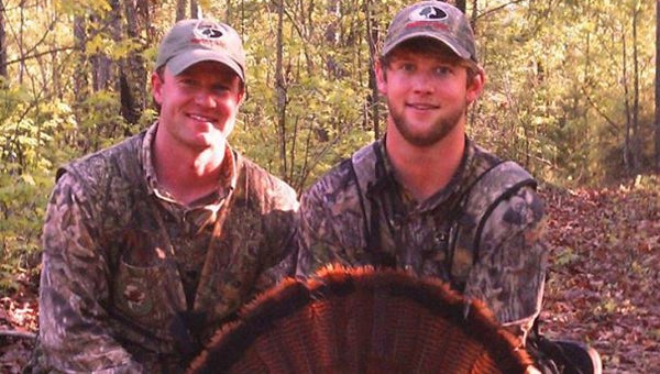 Georgiana’s Jared Lowe, left, and his hunting partner Carter Harsh, claimed second place  at the 2014 Lowndes County Turkey Rodeo last Saturday. Lowe and Harsh won $600 for a bird that scored 67.225 on the Southern Land Brokers scoring system. (Courtesy Photo)
