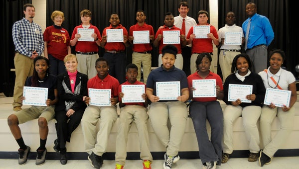 A number of Greenville Middle School students graduated Monday from the Teach One to Lead One program, a 12-week course focused on building character and leadership in youth through presentations, hands-on activities and mentorship. The program also focuses on a curriculum based on 11 universal principles, including respect, integrity, courage, compassion, humility and more. (Advocate Staff/Jonathan Bryant)