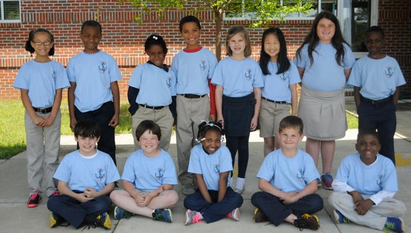 Second graders at W.O. Parmer Elementary School wear their Healthy Kids T-Shirt in support of preventing child abuse and neglect. (Advocate Staff/Andy Brown)
