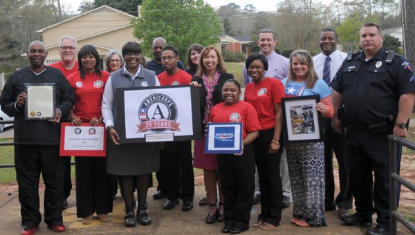 Georgiana Mayor Jerome Antone and Greenville Mayor Dexter McLendon joined with more than 1,760 mayors from across the country to take part in the second annual Mayors Day of Recognition for National Service. Both Antone and McLendon recognized the efforts of the AmeriCorps Instructional Support Team, which serves as instructional assistants in the classrooms of the Butler County School system. AmeriCorps Instructional Support Team is part of the Governor’s Office of Faith-Based and Volunteerism-SERVEALABAMA and The Corporation for National and Community Service. Front row, from left to right, Mayor Jerome Antone; Deirdre Jackson; Christine Williams, State AmeriCorps Program Officer, SERVEALABAMA; Preston Thomas; Amy Bryan, Superintendent; La’Shunda Clayton; Patrice Parmer; Kairee Newton; and Officer Vann Sims. Second row, from left to right, Jerry Stephens; Carol McArthur, AmeriCorps Director; Bonita Thomas; Patrick Davidson; Mallory Schofield; Kent McNaughton, GMS Assistant Principal; and Curtis Black, GMS Principal. (Advocate Staff/Andy Brown)