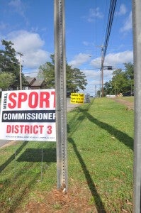 Political ads and event signs line Alabama 10 near downtown Luverne. Signs like these on public utility poles and rights of way will be removed on sight, Police Chief Paul Allen said.