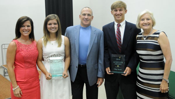 Fort Dale Academy seniors Hannah Johnson, second from the left, and Chip Taylor, fourth from the left, were named the 17th annual Achiever Award winners Thursday night. Pictured from left to right are, Tina Caver, YMCA director, Johnson, keynote  speaker Chuck Karr; Taylor; and Francine Wasden, Greenville Area Chamber of Commerce executive director. (Advocate Staff/Andy Brown)