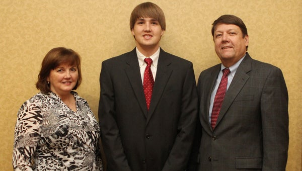 Hudson Branum, of Greenville, was presented with a "Tagged For Greatness" Scholarship at the 71st Annual Alabama Cattlemen's Association Convention and Trade Show in Montgomery. He is pictured with his parents, Nancy and Glenn Branum. (Courtesy Photo)   