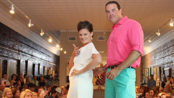 Laura Sadowski and Ben Campbell strike a pose on the runway during the inaugural Southern Social, which featured a fashion show hosted by Southern Mint Boutique and The High Horse Gallery. (Photo by Snazzy Snapshots by Anna)