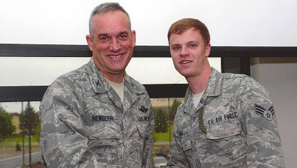 Senior Airman Nicholas Paez is pictured with Col. Brian M. Newberry, commander of the 92nd Refueling Wing. Paez, a graduate of Fort Dale Academy, was recently recognized as one of “Fairchild’s Finest” for his outstanding leadership as the radio frequency transmissions systems journeyman at Fairchild Air Force Base in Washington. (Submitted Photo)