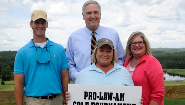 Attorney General Luther Strange, center, attended the annual Camellia Communication Pro-Law Am, which benefits the Butler County Children’s Advocacy Center and the Fraternal Order of Police Lodge No. 39. Also pictured is Greenville Police Department Lt. Justin Lovvorn, left, Butler County District Attorney Charlotte Tesmer, front, and Kathy Smyth, director of the Butler County Children’s Advocacy Center, right. (Advocate Staff/Jonathan Bryant)