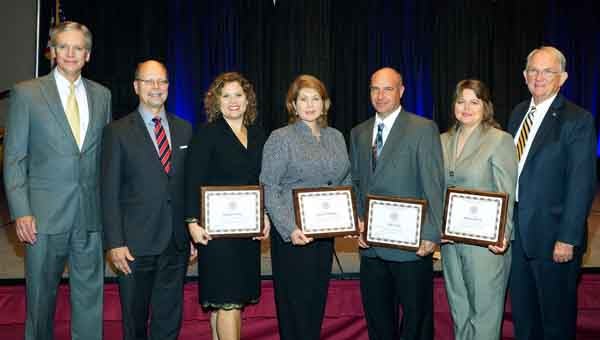 SUBMITTED PHOTO | LBW LBW Community College employees were recently recognized during the 2014 Chancellors Award ceremony held in Birmingham. Pictured are, from left, Alabama Community College System Chancellor Dr. Mark Heinrich; LBWCC President Dr. Herb Riedel; Heather Owen, director of recruitment, LBWCC’s Outstanding Administrator; Sharon Stricklin, mathematics instructor in Opp and Luverne, Outstanding Academic Faculty; Allen Teel, industrial electronics instructor in Opp, Outstanding Technical Faculty; Melissa Reeves, administrative assistant in Luverne, Outstanding Support Staff; and LBWCC Vice President Dr. Jim Krudop, Greenville campus director. 