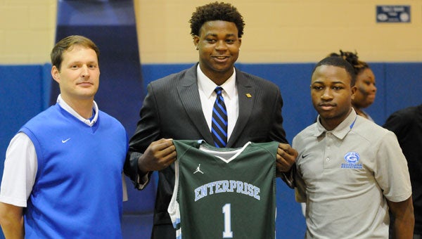 Family, friends and coaches all looked on as Georgiana senior Jeremy Sims signed a letter of intent to play basketball for Enterprise State Community College on Thursday.  Sims averaged 10.2 points, 7.8 rebounds and 2 blocks per game for the Panthers in the 2014-15 season.