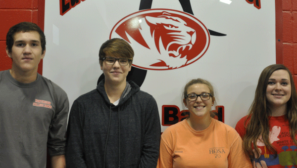 Four students from the Luverne High School marching band will have the opportunity to participate in the Huntingdon Symphonic Honor Band in Montgomery on Jan. 8 and 9. Pictured are, from left to rihght, Corbin Knott, Jayden Carlos, MacKenzie Carlos and Katie Marie Smith. (Photo by Beth Hyatt) 