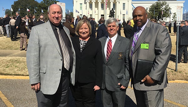 Hundreds of law enforcement officials from across the state gathered at the Capitol on Wednesday as part of the Alabama Law Enforcement Alliance for Public Safety to inform the public and the Legislature of the unique needs of law enforcement and to highlight concerns facing law enforcement. Pictured are, from left to right, Greenville Police Chief Lonzo Ingram, Butler County District Attorney Charlotte Tesmer, Butler County Sheriff Kenny Harden and Assistant Executive Director of Pardons and Paroles Eddie Cook. 