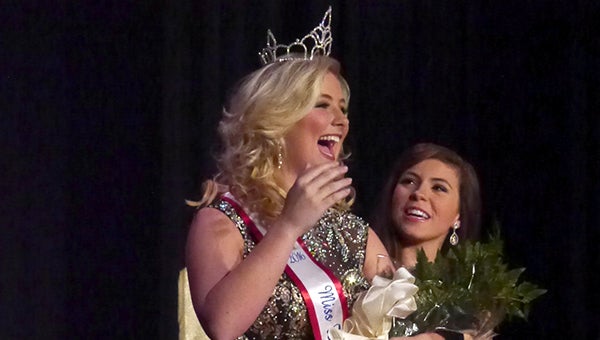 Kendall Lambert reacts after being crowned Miss Fort Dale Academy Saturday night at the historic Ritz Theatre in downtown Greenville. (Advocate Staff/Angie Long)