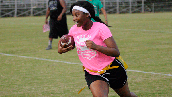 Georgiana junior Miya Riley proved equally capable of shaking defenders on the gridiron as well as the basketball court during Thursday’s inaugural Georgiana Powderpuff Football Fundraiser.
