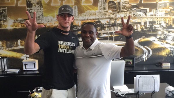 Brantley High School quarterback Jacob Free has officially committed to be a Vanderbilt University Commodore. Pictured is Free with Vanderbilt head coach Derek Mason. 