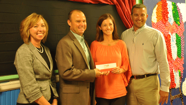 Greenville Elementary School was presented the Good Roots grant from Alabama Power. Pictured are, from left to right, Superintendent of Butler County Schools Amy Bryan, Alabama Power’s David Norwood, Library and Media Specialist Shera Stinson and GEX Principal Kent McNaughton.