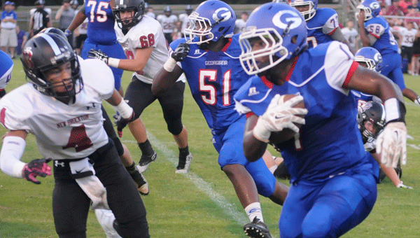 Georgiana running back Cameron Longmire outruns the New Brockton defensive front during the first quarter.