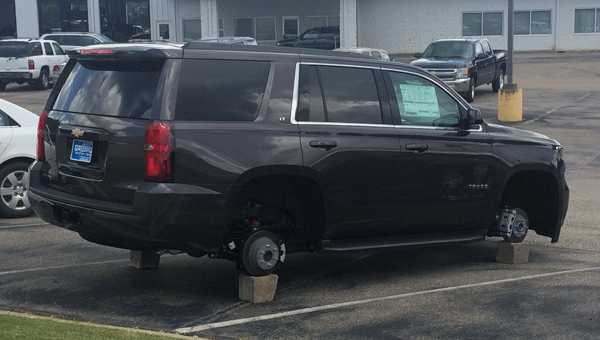 Pictured above is one of five vehicles whose tires and rims were stripped and taken from the Greenville Motor Company lot between July 29 and Aug. 12.