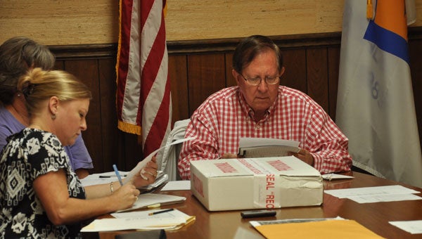 A week after Luverne and other local towns held elections, provisional ballots were gathered and tallied into the overall totals for each candidate by Mayor Pat Walker and members of Luverne City Hall. (Photos by Beth Hyatt) 