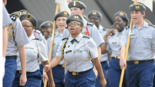 Cadet Captain Olivia Powell calls out cadences to the Greenville High School JROTC battalion. 