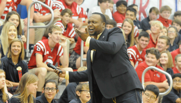Former University of Alabama national champion Chris Rogers led a Roll-Tide chant before speaking to Fort Dale Academy students in grades 5-12 Friday morning.