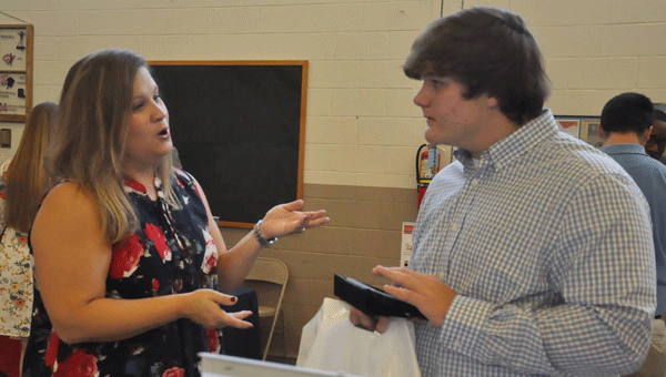 Heather Owens, director of student recruitment for LBWCC, tells seniors about their college options for LBW campuses (Photo by Beth Hyatt). 