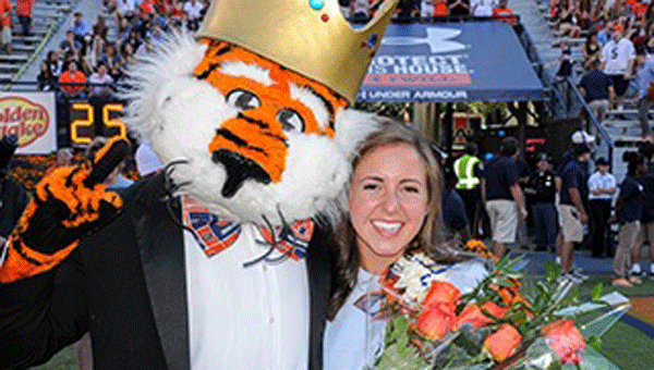 Kate Hardman poses with Aubie during Homecoming celebrations. 