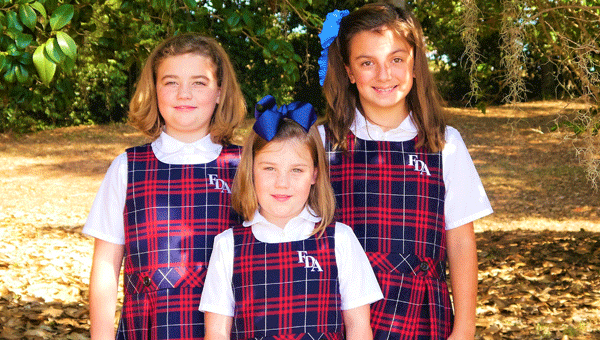 Lillian Faith Baker, Anna Grace Baker and Charlotte Kate Anderson spoke to the Greenville Kiwanis Club Tuesday about their near-year-long charity called The Faith Project, which began in Dec. 2015.