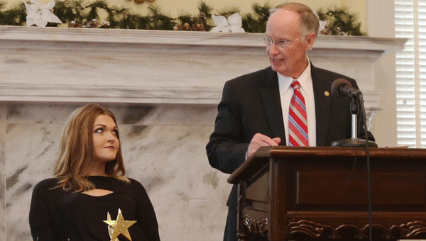 Alabama Governor Dr. Robert Bentley congratulates LBW Community College student Chelsea Huggins, left, for being selected as the 2016 Student of the Year by the Alabama Governor’s Committee on Employment of People with Disabilities during a ceremony held in the Alabama State Capitol.