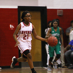 Sophmore Ty'Keria Means pushes the ball down court against the Brantley Lady Bulldogs on Monday. The Lady Tigers closed in on a 10 point gap within the last three minutes of play, but fell short to Brantley 32-29.