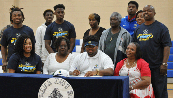 Flanked by friends and family, Georgiana senior Jaden Longmire made his commitment to Point University official Wednesday morning at Georgiana’s R.L. Austin Gymnasium.