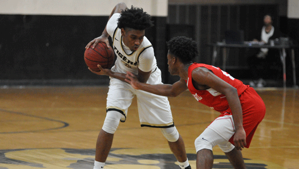 Charles Warren delivered a pair of 3 pointers that proved fatal to Carroll’s momentum at the top of the second half in Greenville’s runaway 88-61 win over the Carroll Eagles.