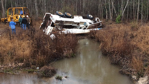 A wreck occurred Tuesday morning on Highway 106 near Dozier, spilling oil and gas in a small creek. 